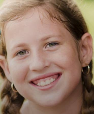 young girl smiling