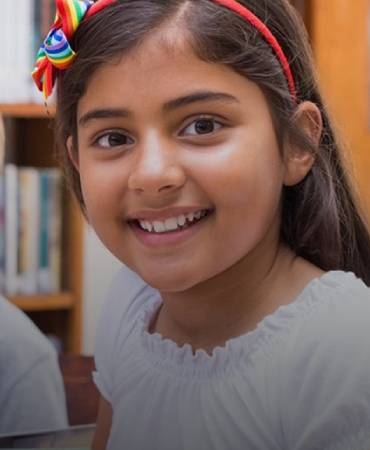 young girl looking happy