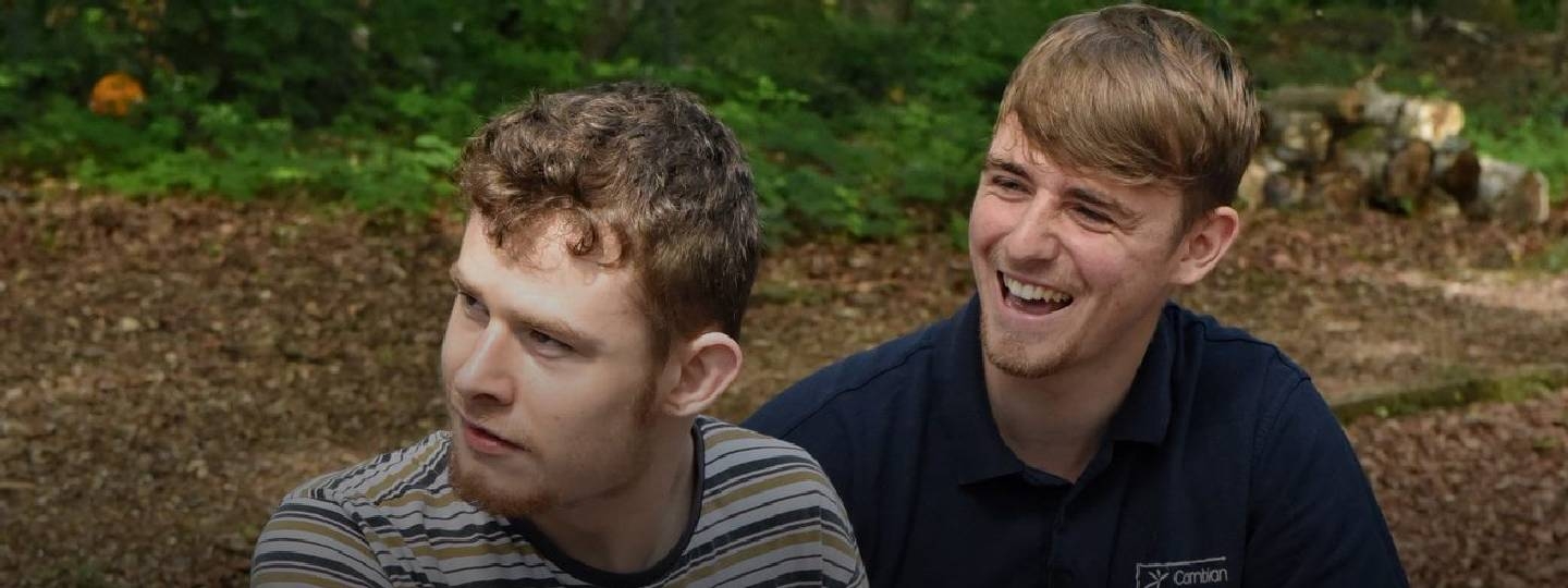 young man and his carer