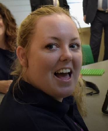  carer talking and smiling.