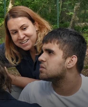 Young man and carer.