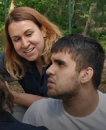 Young man and carer.