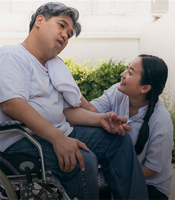 stroke patient and his carer.
