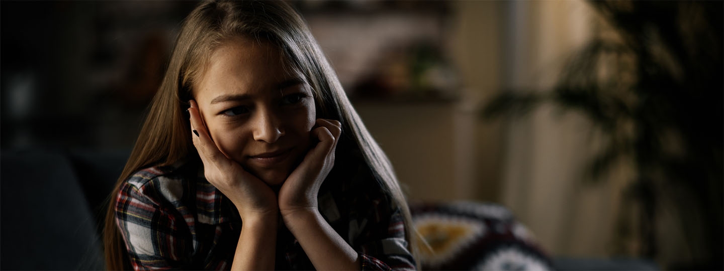 girl with head in her hands