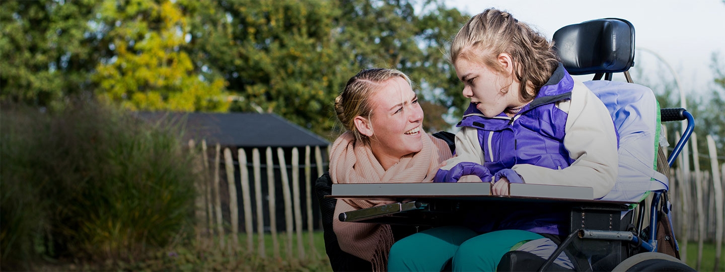 disabled girl and carer.