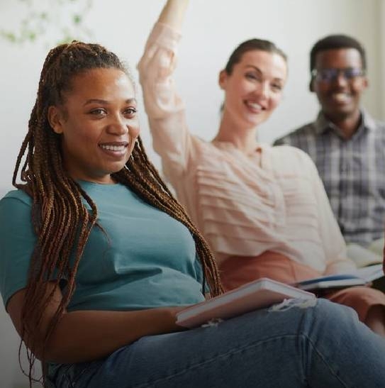 people smiling in a class.